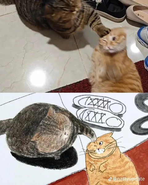 Кот гладит испуганного котёнка