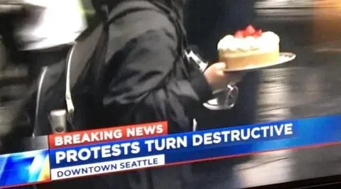 Protests Turn Destructive Cake Pun