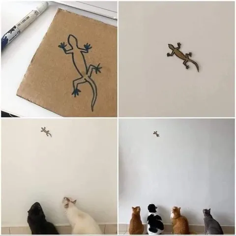 Коты смотрят на ящерицу