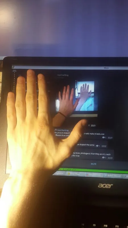Hand Reaching Through the Screen