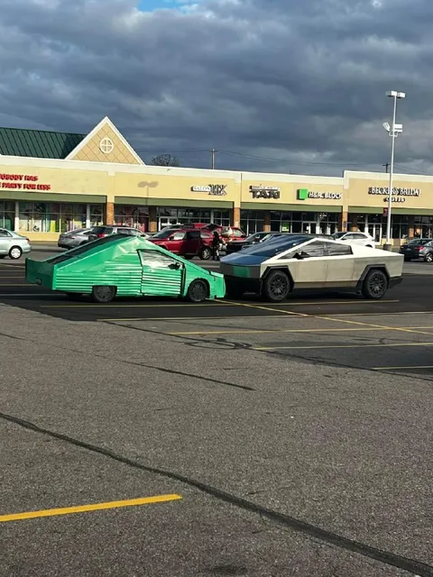 Cardboard Cybertruck Meets the Real One