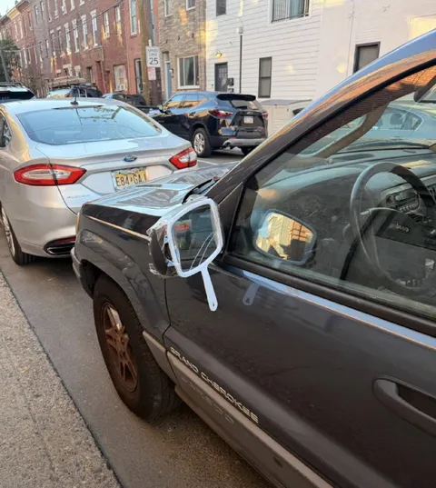 Jeep Mirror Wrapped in Plastic