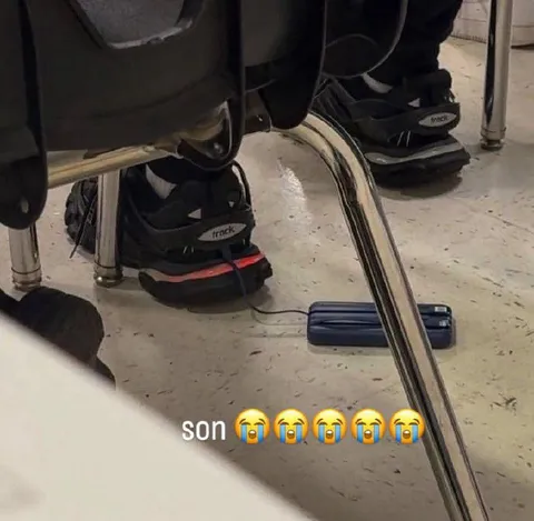 Son Tied to His Chair