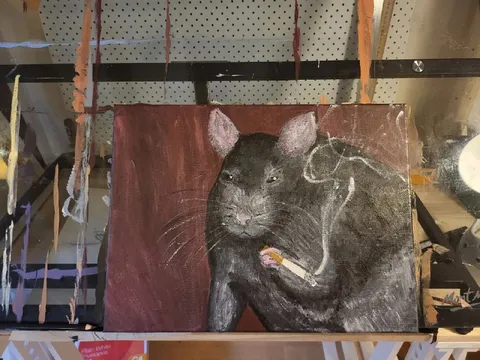 Кот курит сигарету