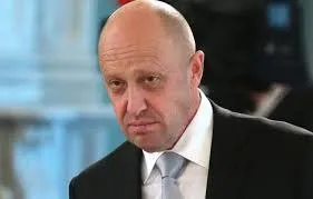 Пригожин с унылым выражением лица