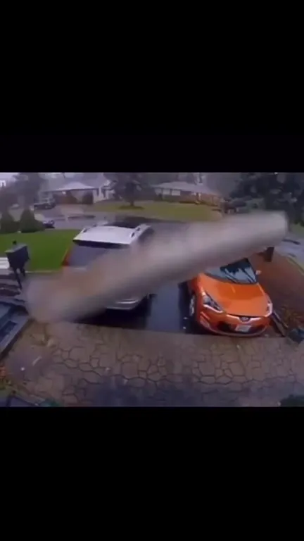 Canoe Between Two Cars
