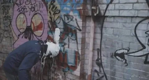 Person Vomiting on Graffiti