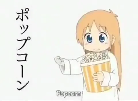 ポップコーンを差し出す少女