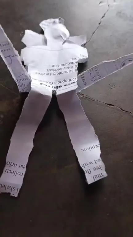 Paper Doll Slowly Crawls Away