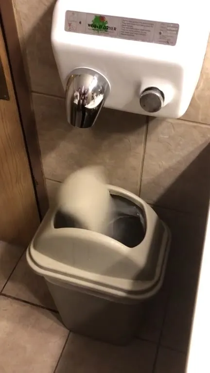 Trash Can Gets Blown Away