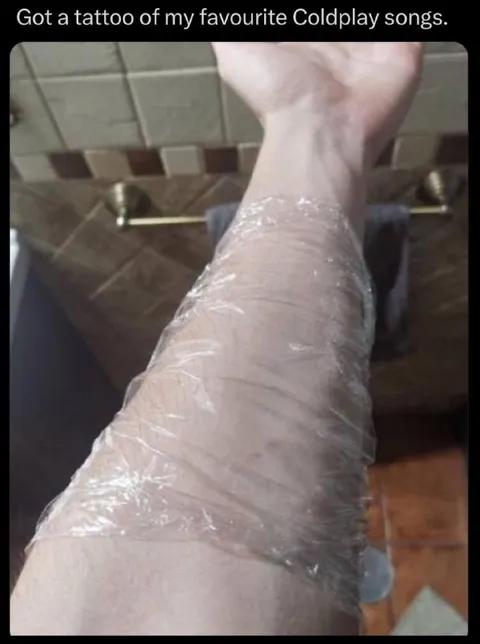 Coldplay Tattoo Wrapped in Plastic