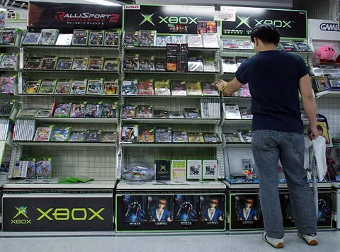 Man Browsing the Xbox Wall