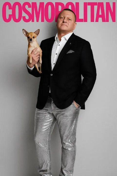 Man Holding a Chihuahua