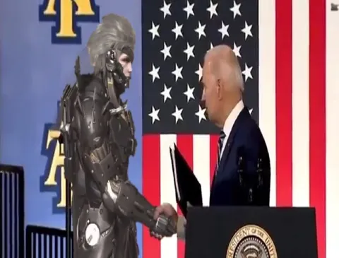 Raiden Shakes Hands With Biden