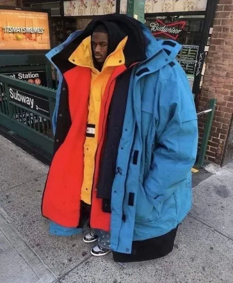 Man Wearing Too Many Coats