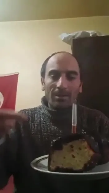 Birthday Cake With a Cigarette Candle