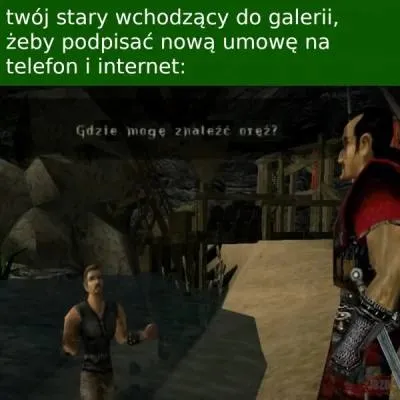 Stary podpisuje umowę w galerii