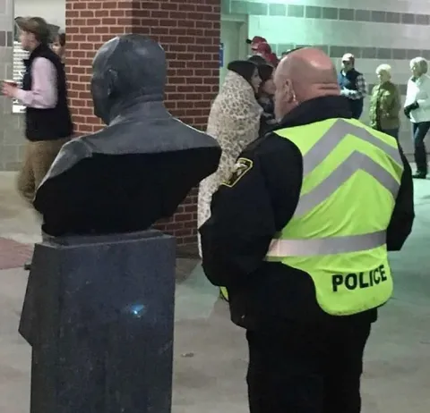 Police Questioning a Bust
