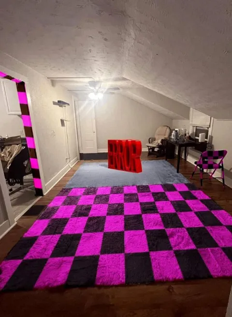 Red RUG on a Checkerboard Rug