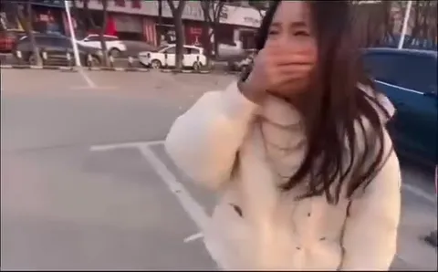 Covering Her Nose Then Hitting the Sign