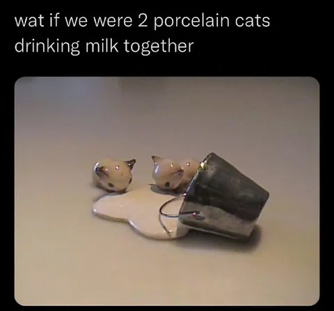 Two Porcelain Cats Drinking Milk