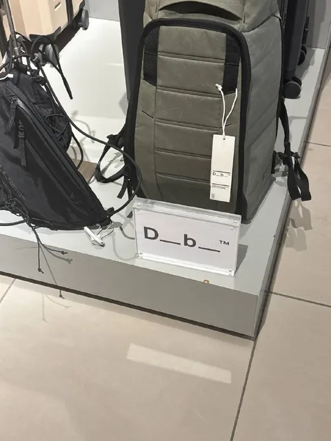 Зашифрованный логотип рюкзака