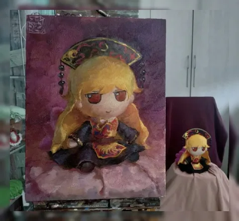 Кукла на картине и стуле