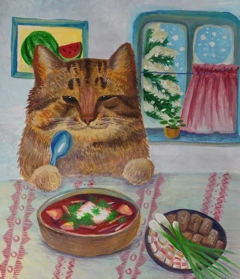 Кот за обедом