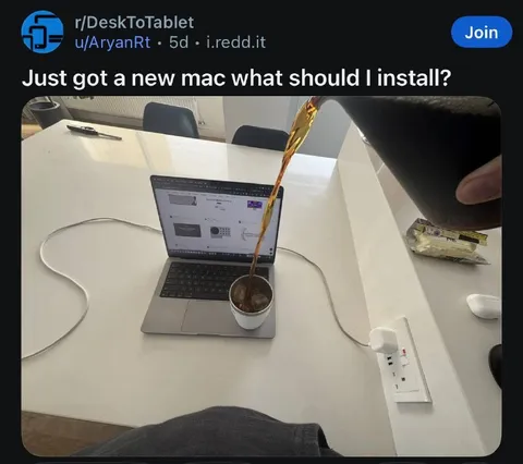 Pouring Coffee Into a New Mac