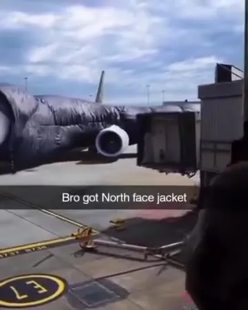 Airplane Wearing a North Face Jacket