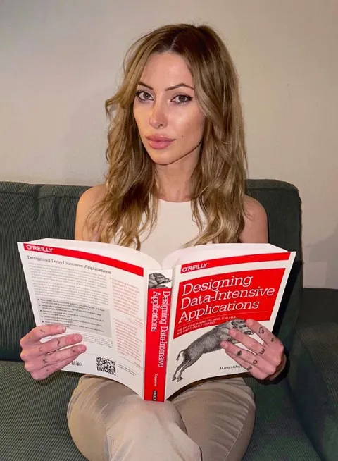 Woman Reading a Data Book