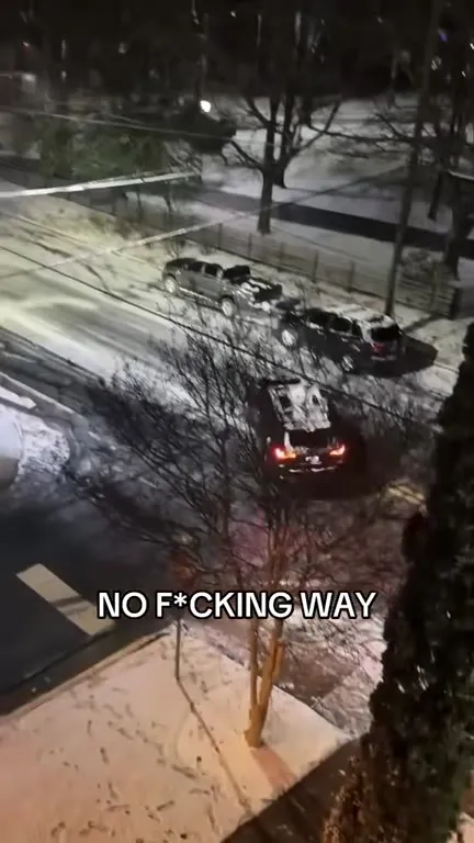 SUV Slides Into Parked Cars