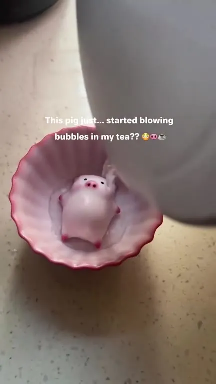 Pig Blowing Bubbles in Tea