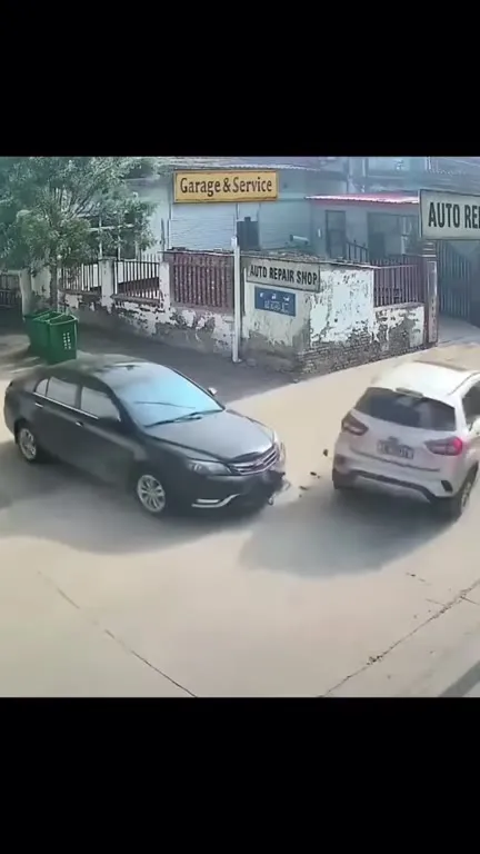 Cars Crash Outside Auto Repair Shop