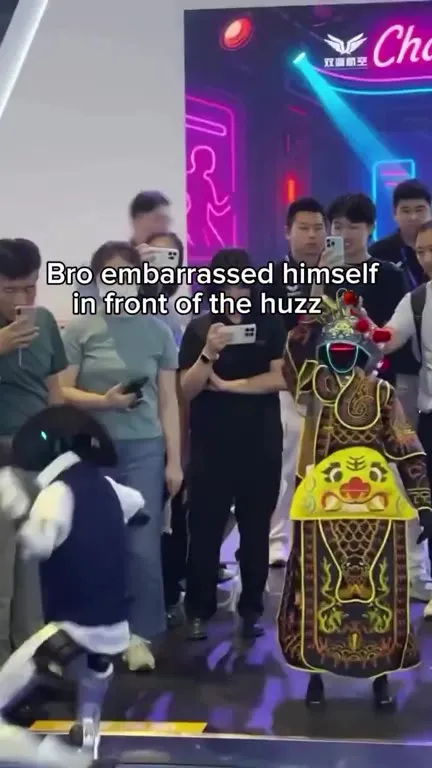 Robot Falls in Front of the Huzz