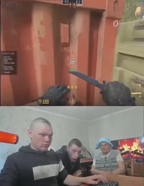 Парень играет в CS под присмотром
