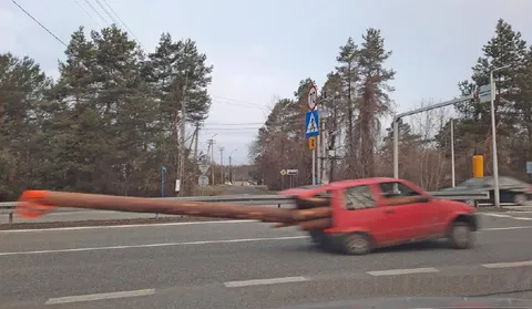 Машина с гигантским прицепом