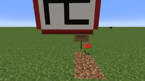 Могила в Minecraft с надписью RIP