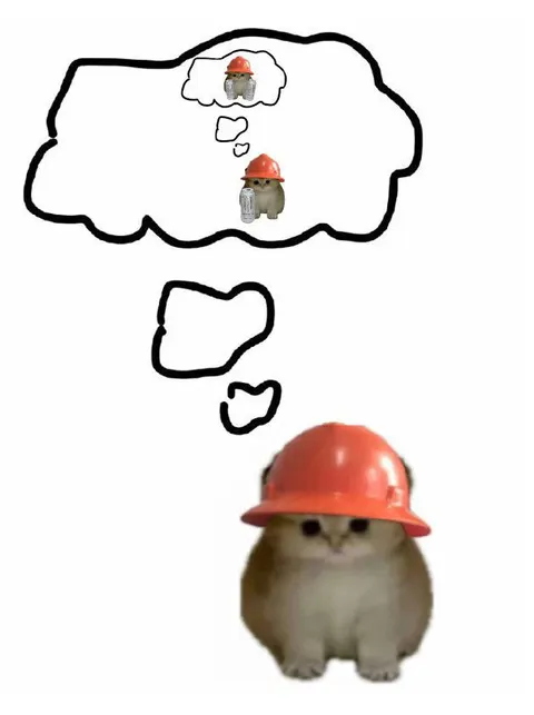 Котёнок в каске думает о себе