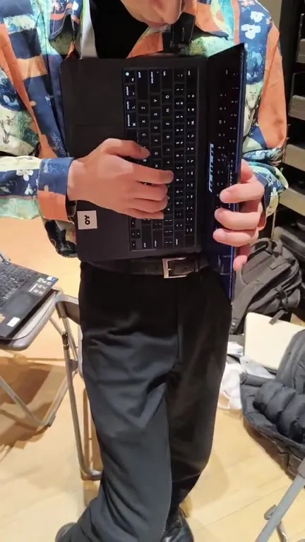 Human Laptop Piano Performance