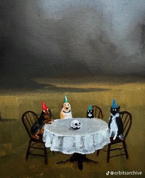Кошачий ужин со скелетом