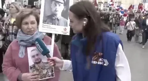 Интервью на шествии с портретами