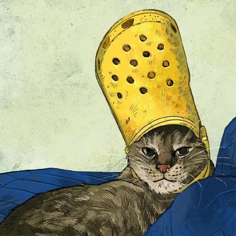 Кот в шапке из хлеба