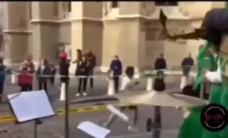 Тромбонист в зелёном костюме