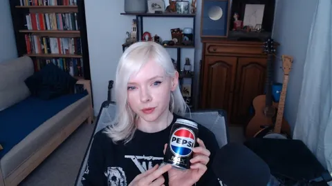 Blonde Streamer Holding Pepsi