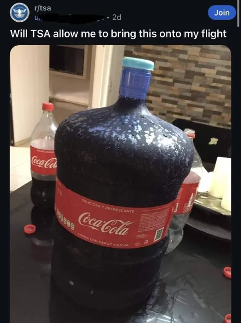 Giant Coca-Cola Bottle on a Flight