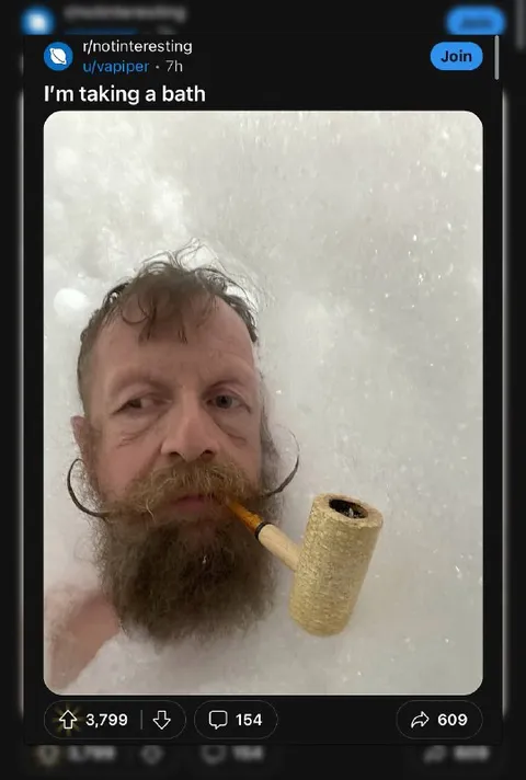 Bearded Man Taking a Bath