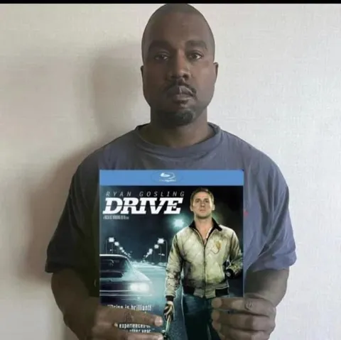 Man Holding Drive DVD