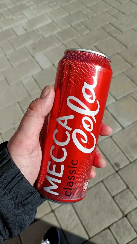 Mecca Cola in Hand