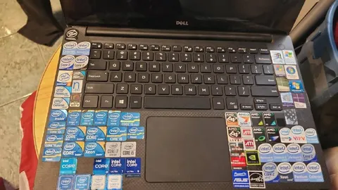 Laptop Covered in Stickers